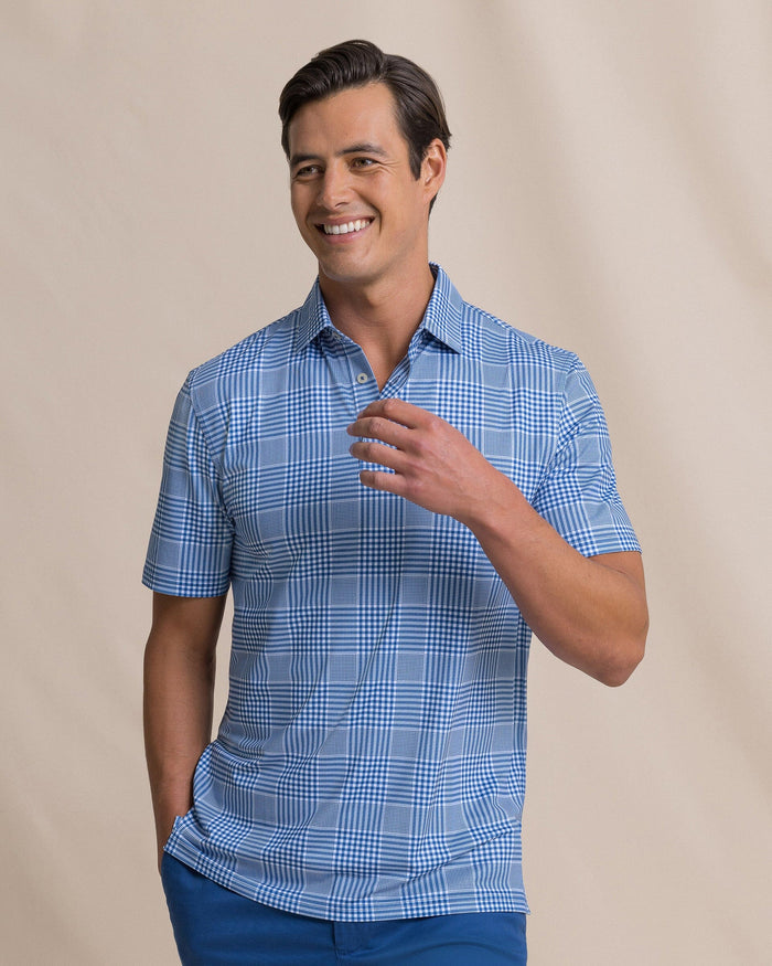 The front view of the Southern Tide Driver Coral Key Plaid Printed Polo by Southern Tide - Nautical Blue