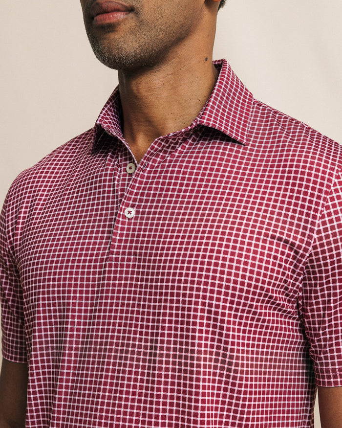 The detail front view of the Southern Tide Driver Dunes Edge Team Colors Plaid Polo by Southern Tide - Chianti