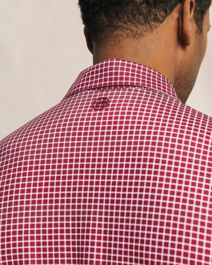 The detail back view of the Southern Tide Driver Dunes Edge Team Colors Plaid Polo by Southern Tide - Chianti
