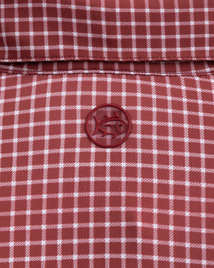 The detail view of the Southern Tide Driver Dunes Edge Team Colors Plaid Polo by Southern Tide - Crimson