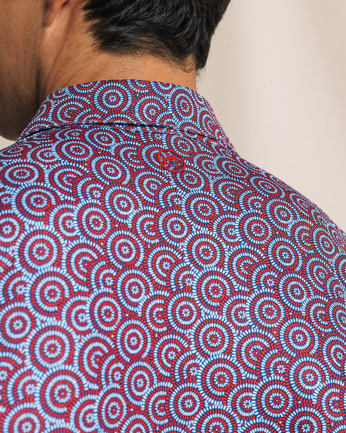 The detail view of the Southern Tide Driver Fireworks Printed Polo by Southern Tide - Channel Marker Red
