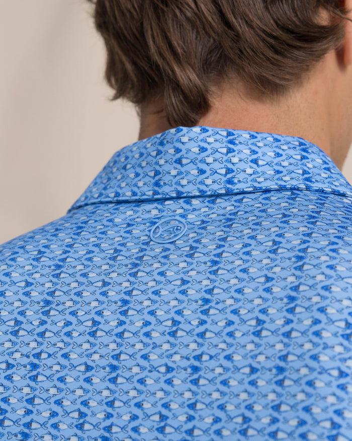 The detail view of the Southern Tide Driver Fish Printed Polo by Southern Tide - Ocean Channel