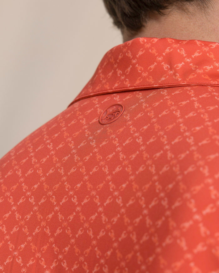 The detail view of the Southern Tide Driver Lobster Printed Polo by Southern Tide - Burnt Sienna