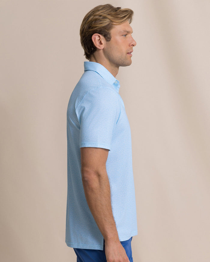 The side view of the Southern Tide Driver Paradise Shores Printed Polo by Southern Tide - Tropical Breeze Blue