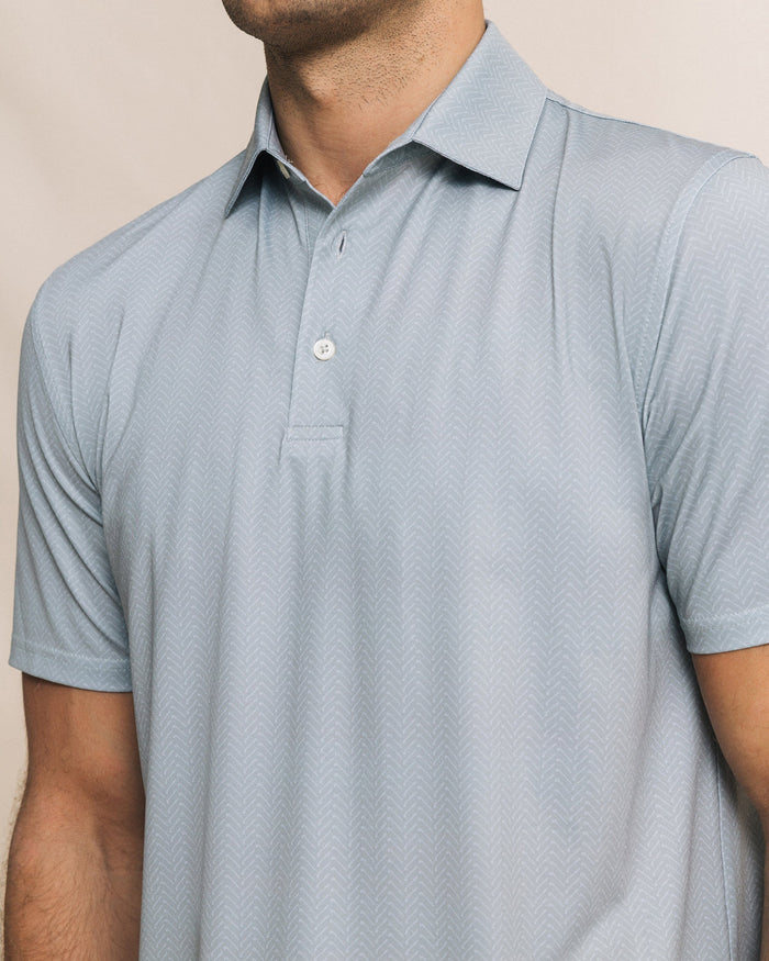 The detail view of the Southern Tide Driver Raise The Par Printed Polo by Southern Tide - Steel