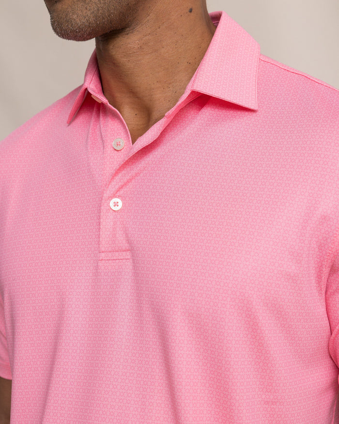 The detail view of the Southern Tide Driver Seaside Geo Printed Polo by Southern Tide - Sea Pink