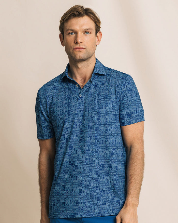 The front view of the Southern Tide Driver ST Nautical Flag Printed Polo by Southern Tide - Nautical Blue