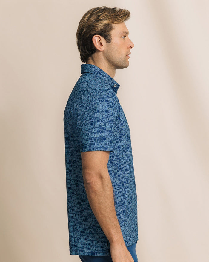 The side view of the Southern Tide Driver ST Nautical Flag Printed Polo by Southern Tide - Nautical Blue