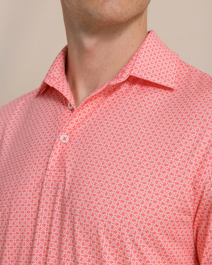 The detail view of the Southern Tide Driver Weaving Around Printed Polo by Southern Tide - Coral Beach