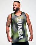 Male model wearing a black and yellow halftone dot-print tank top with "ZUMBA" in big vertical white text down the middle.