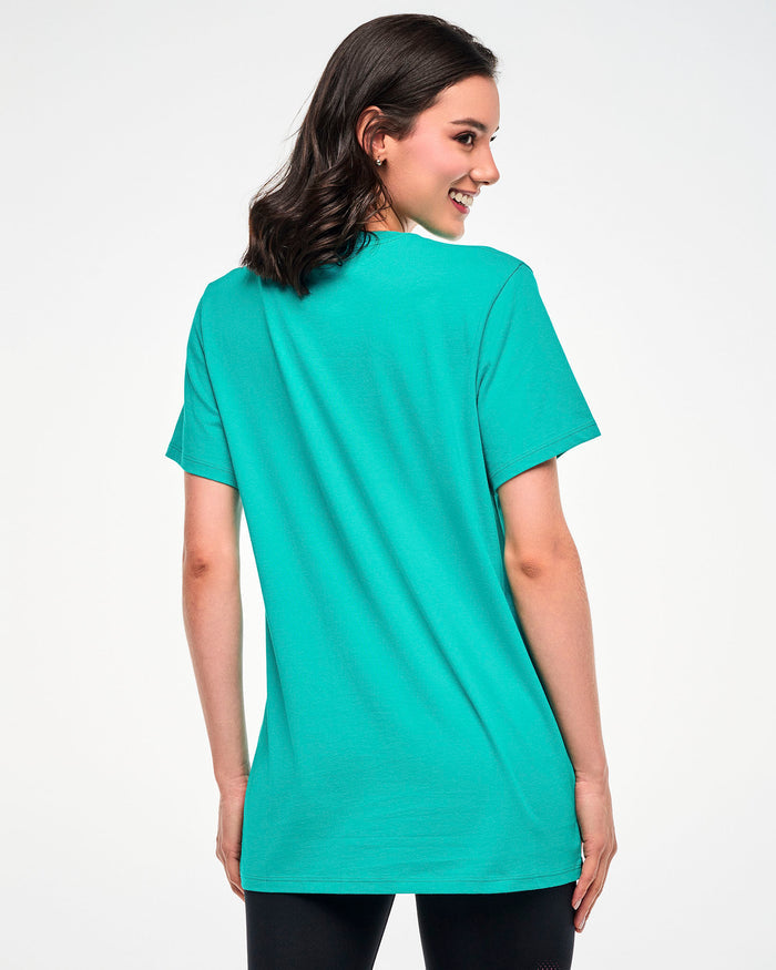 Back view of a female model wearing an aqua tee.