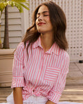 The lifestyle view of the Southern Tide Emery Button Front Shirt by Southern Tide - Sea Pink