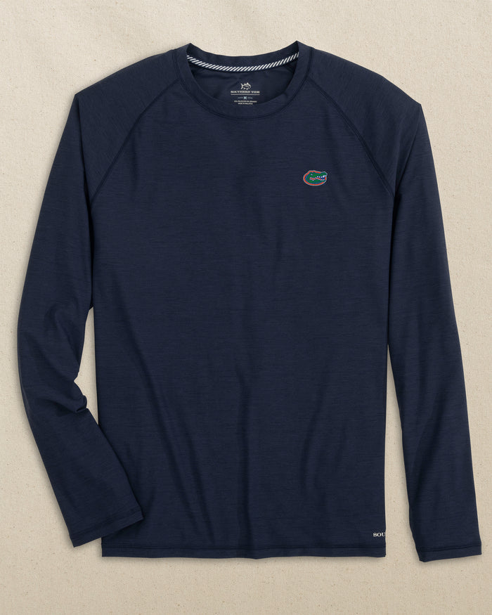 The front view of the Southern Tide Florida Gators brrr°®-illiant Performance Long Sleeve T-Shirt by Southern Tide - Nautical Navy