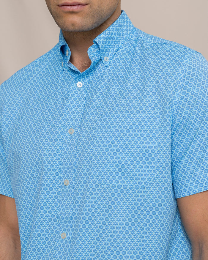 The detail view of the Southern Tide Flower Garden Coastal Breeze® Short Sleeve Sport Shirt by Southern Tide - Tropical Breeze Blue