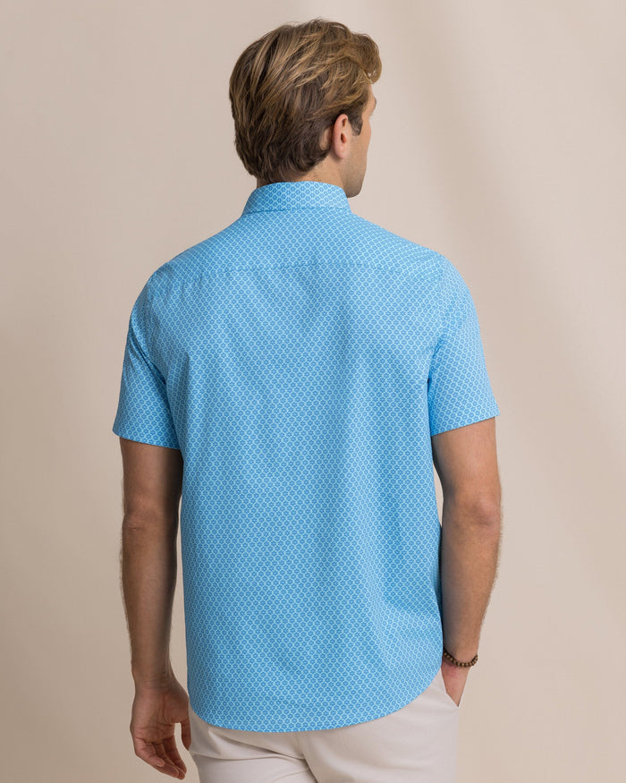 The back view of the Southern Tide Flower Garden Coastal Breeze® Short Sleeve Sport Shirt by Southern Tide - Tropical Breeze Blue