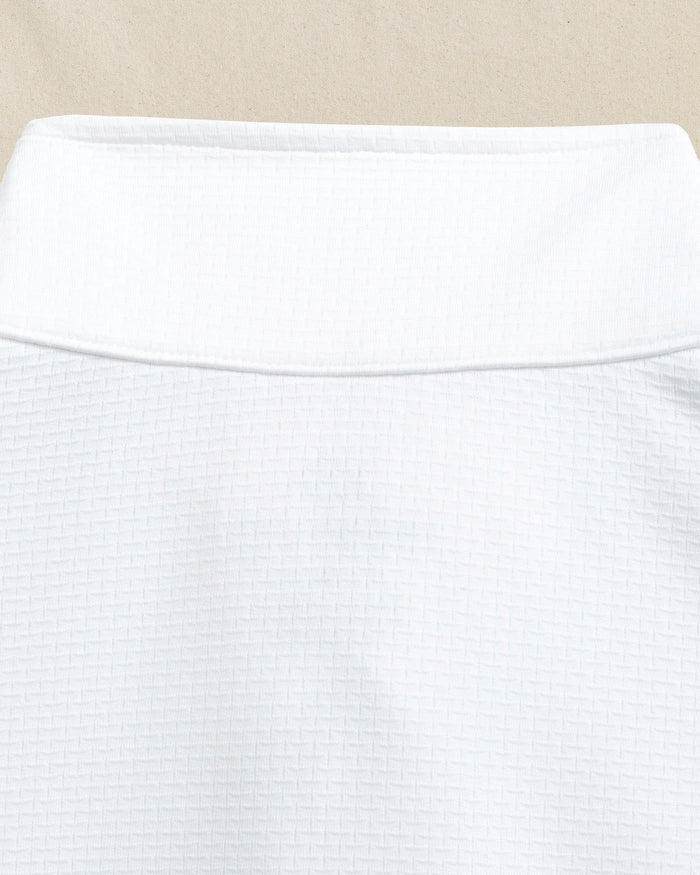 The detail view of the Southern Tide Georgia Bulldogs Schooner Quarter Zip by Southern Tide - Classic White