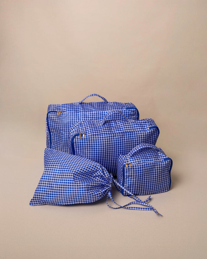 The set view of the Southern Tide Gingham Packing Cubes 4-Piece Set by Southern Tide - Blue