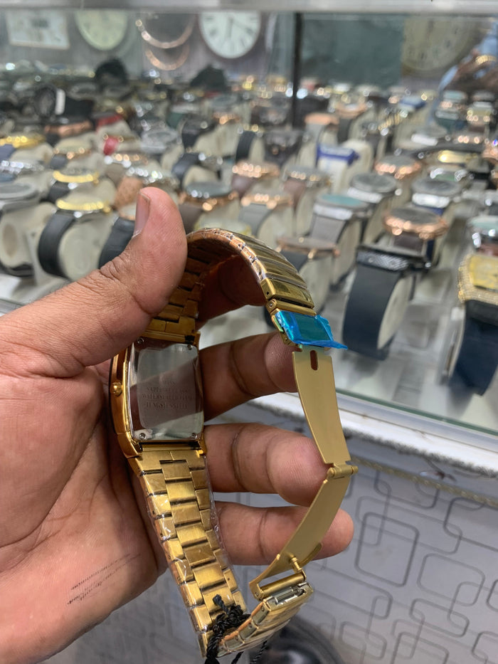Gold-tone case with a black dial watch ;date Style watch Stainless steel band