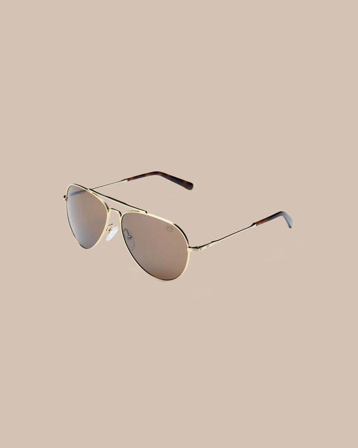 The side view of the Southern Tide Greenville Aviator by Southern Tide - Yellow Gold Frame with Desert Sand Lens