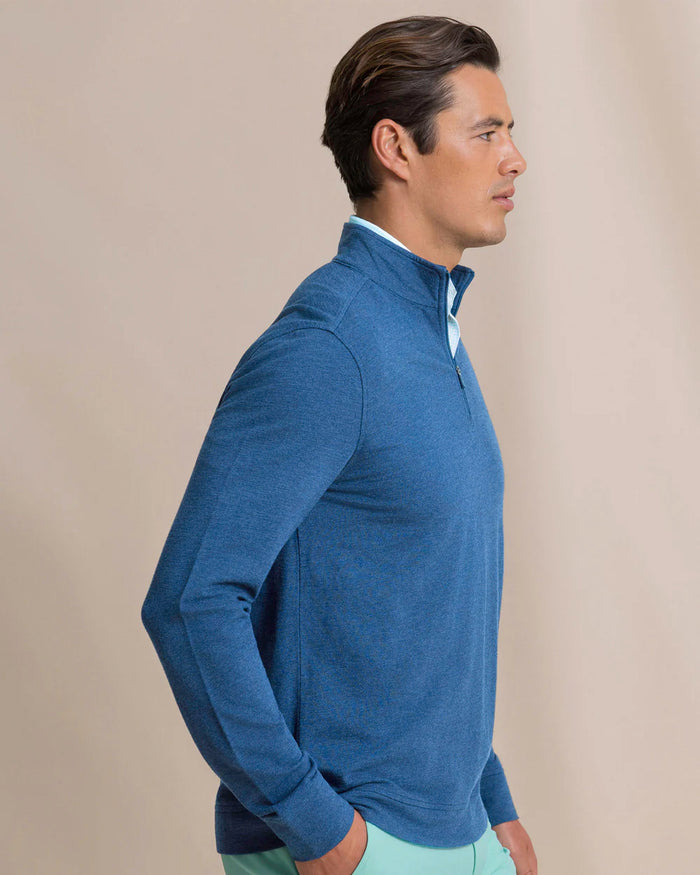 The side view of the Southern Tide Gulf View Heather Quarter Zip by Southern Tide - Heather Nautical Blue