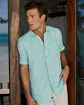 The lifestyle view of the Southern Tide Gulf View Short Sleeve Sport Shirt by Southern Tide - Starboard Green