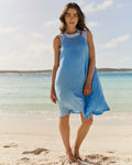 The front lifestyle view of the Southern Tide Halter Neck Short Cover-Up Dress by Southern Tide - Ocean Channel