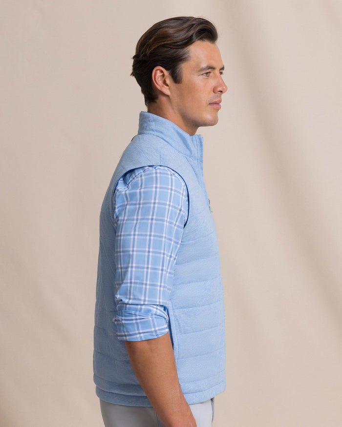 The side view of the Southern Tide Harbor Reversible Vest by Southern Tide - Nautical Blue