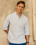 The lifestyle view of the Southern Tide Harborview Charleston Oxford Stripe Sport Shirt by Southern Tide - Ocean Channel