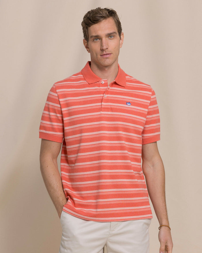 The front view of the Southern Tide Heather Striped Skipjack Polo by Southern Tide - Heather Coral Beach