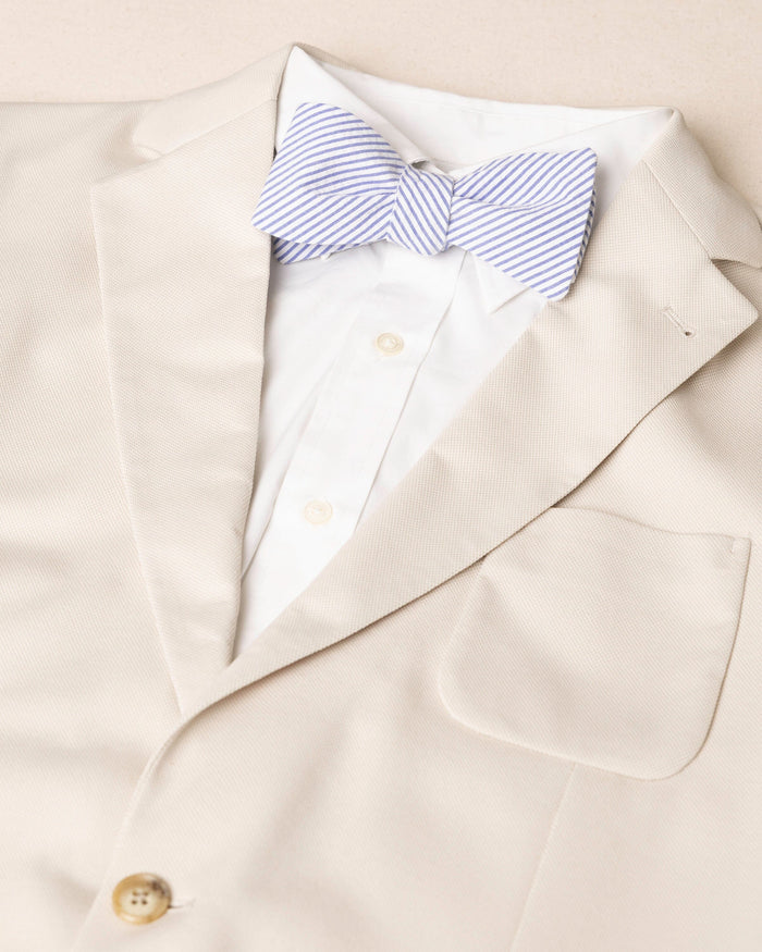 The detail coat view of the Southern Tide Blue and White Seersucker Bow Tie by Southern Tide - Blue