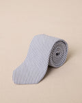 The front rolled view of the Southern Tide Blue and White Seersucker Necktie by Southern Tide - Blue