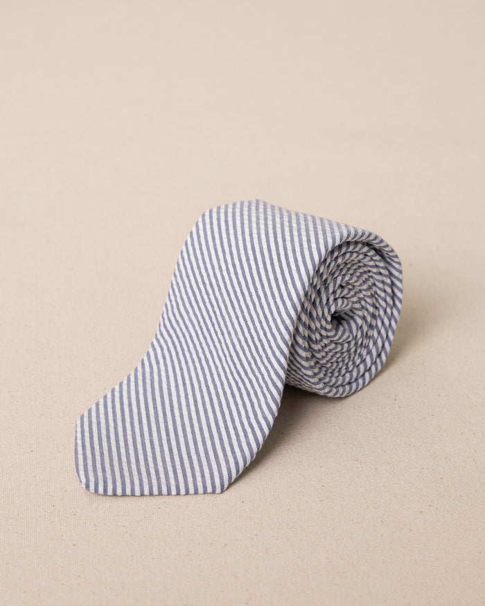 The front rolled view of the Southern Tide Blue and White Seersucker Necktie by Southern Tide - Blue