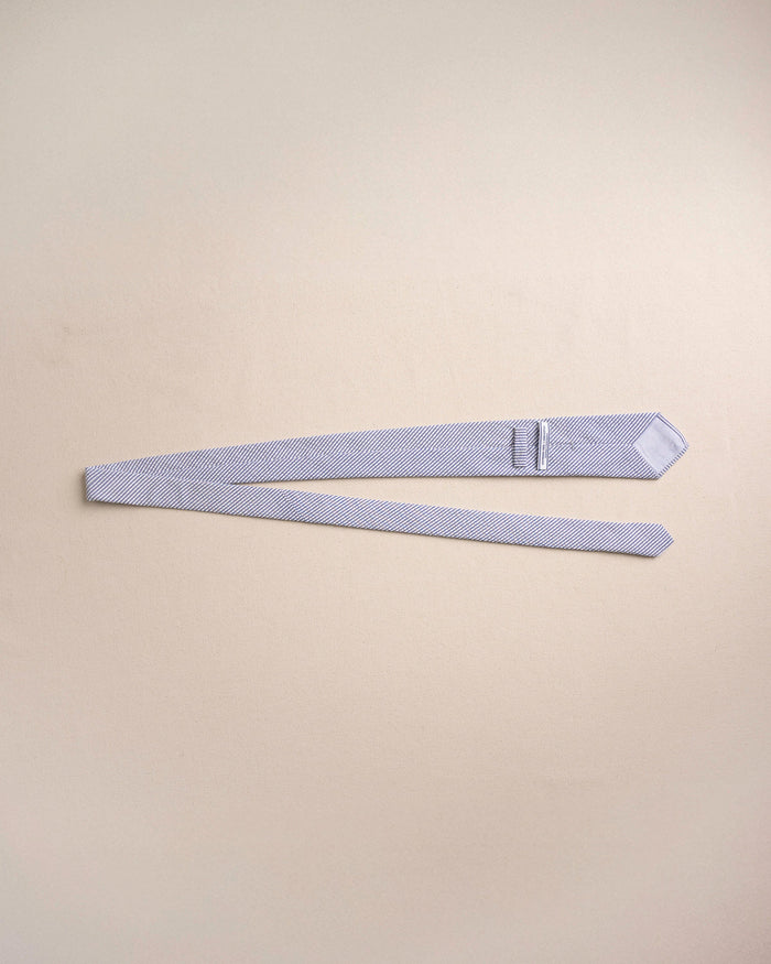The untied view of the Southern Tide Blue and White Seersucker Necktie by Southern Tide - Blue