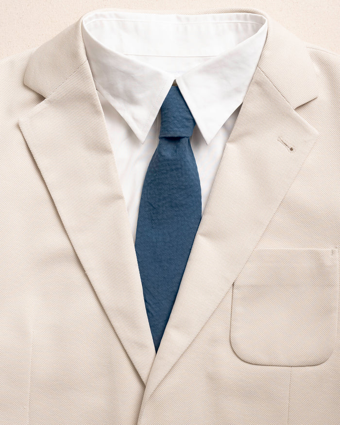 The detail coat view of the Southern Tide Nautical Blue Seersucker Necktie by Southern Tide - Nautical Blue