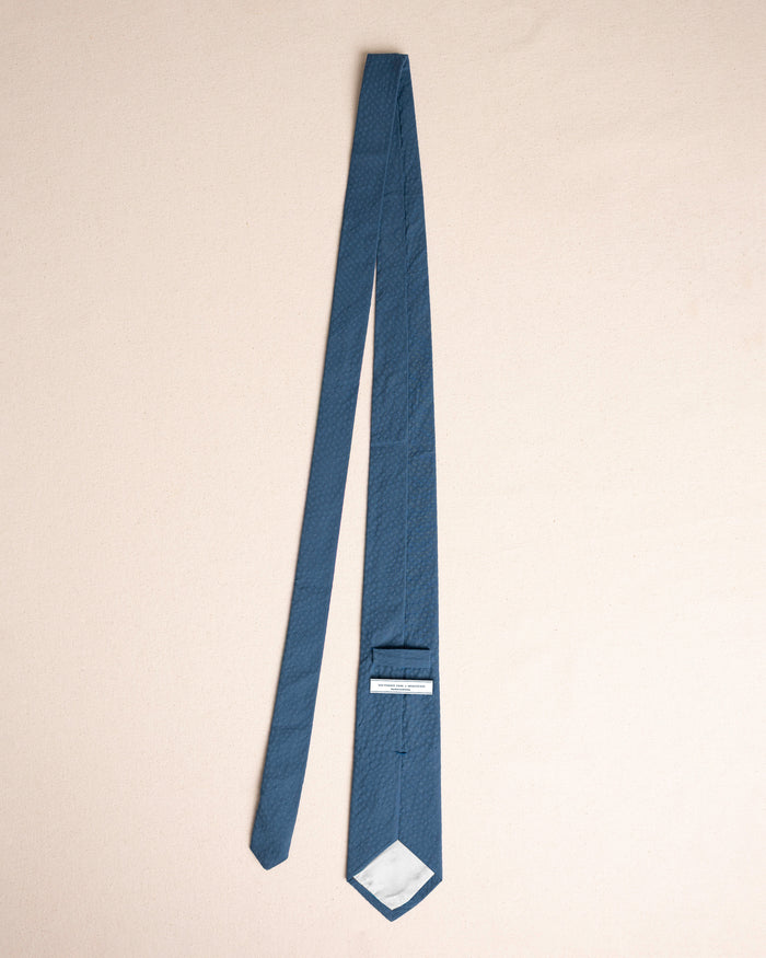 The untied view of the Southern Tide Nautical Blue Seersucker Necktie by Southern Tide - Nautical Blue