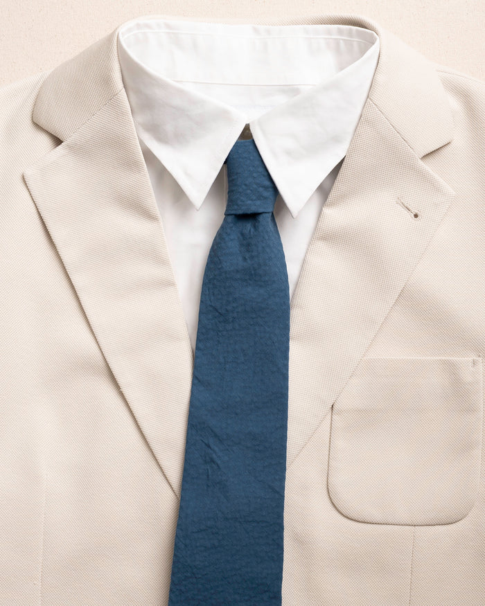 The detail coat view of the Southern Tide Nautical Blue Seersucker Necktie by Southern Tide - Nautical Blue