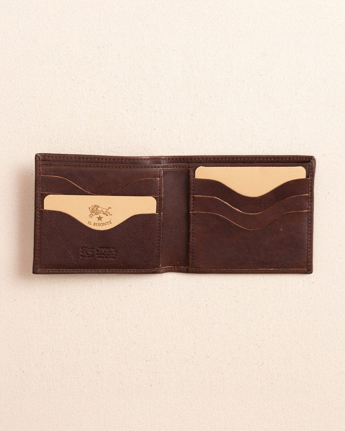 The open view of the Il Bisonte Classic Bifold Wallet at Southern Tide - Coffee