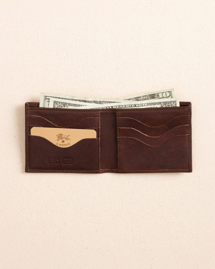 The open view of the Il Bisonte Classic Bifold Wallet at Southern Tide - Coffee