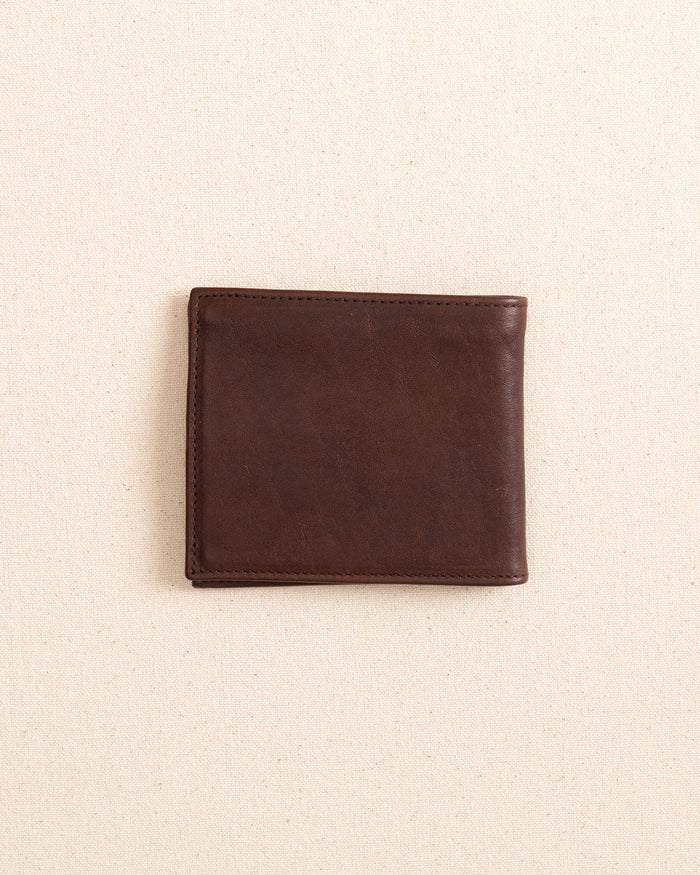 The back view of the Il Bisonte Classic Bifold Wallet at Southern Tide - Coffee