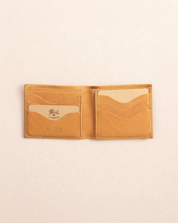 The open view of the Il Bisonte Classic Bifold Wallet at Southern Tide - Natural