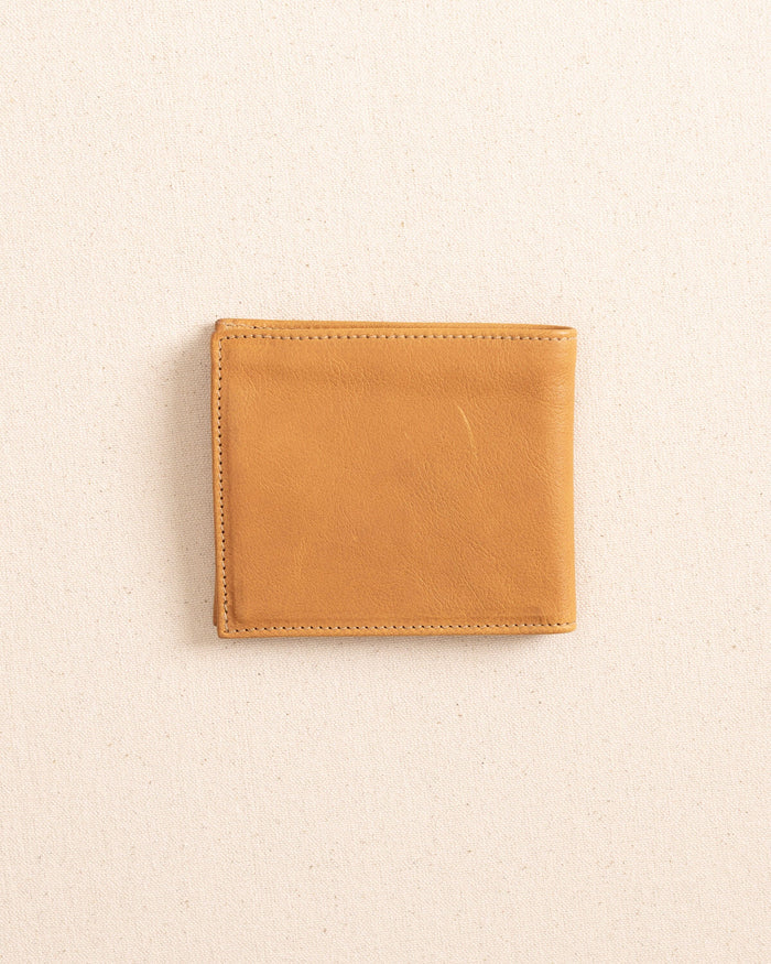 The back view of the Il Bisonte Classic Bifold Wallet at Southern Tide - Natural
