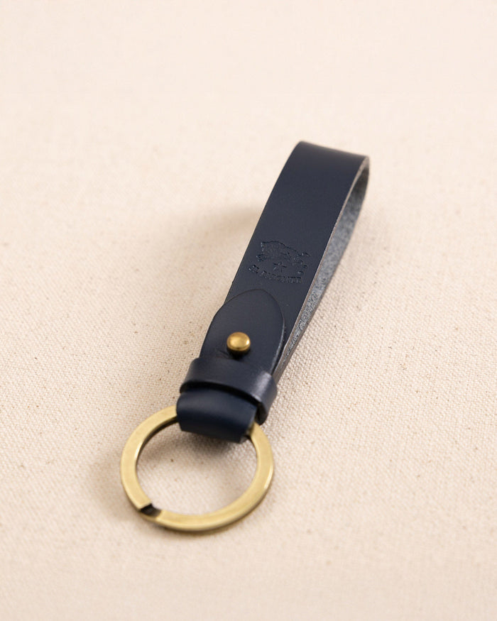 The detail view of the Il Bisonte Classic Key Fob at Southern Tide - Blue