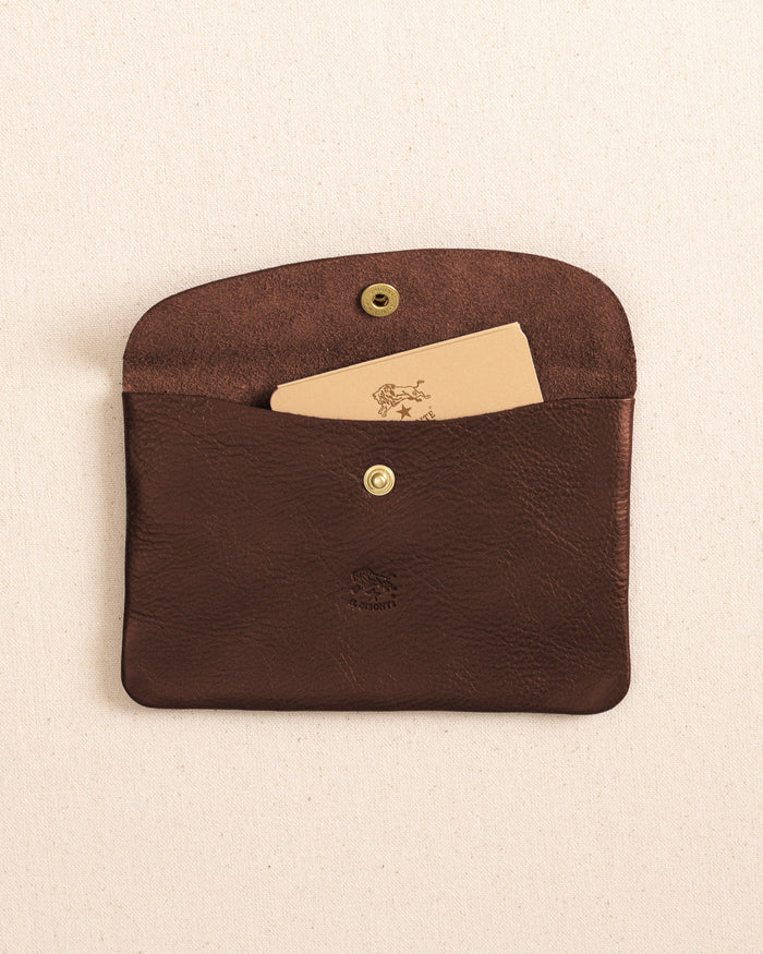 The open view of the Il Bisonte Leather Envelope Pouch at Southern Tide - Coffee