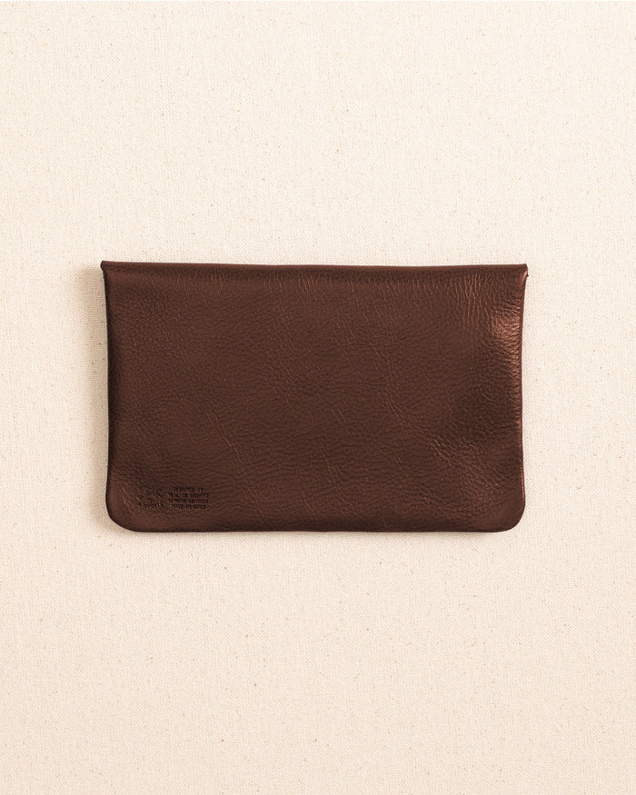 The back view of the Il Bisonte Leather Envelope Pouch at Southern Tide - Coffee