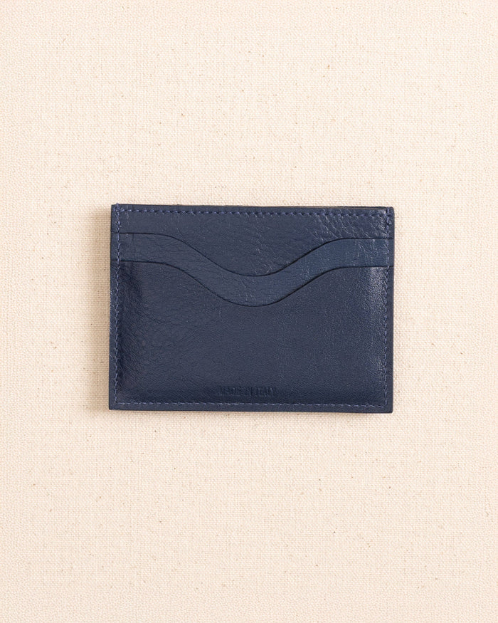 The back view of the Il Bisonte Salina Card Case at Southern Tide - Blue