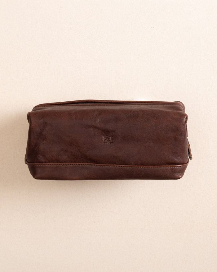The front view of the Il Bisonte Travel Bag at Southern Tide - Coffee