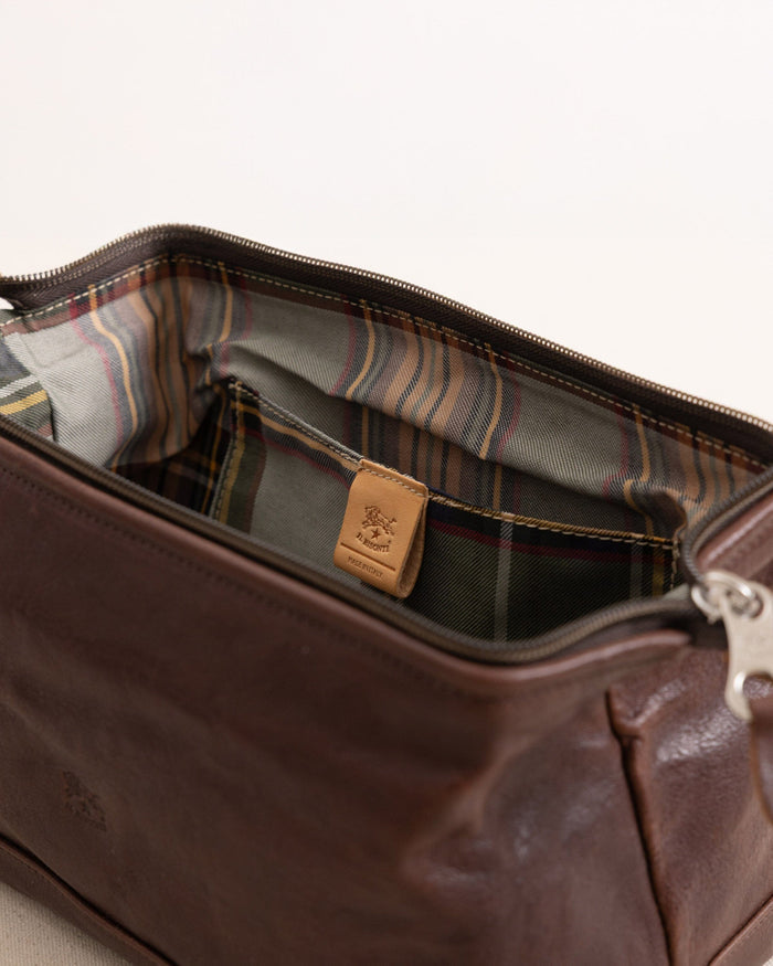 The detail view of the Il Bisonte Travel Bag at Southern Tide - Coffee