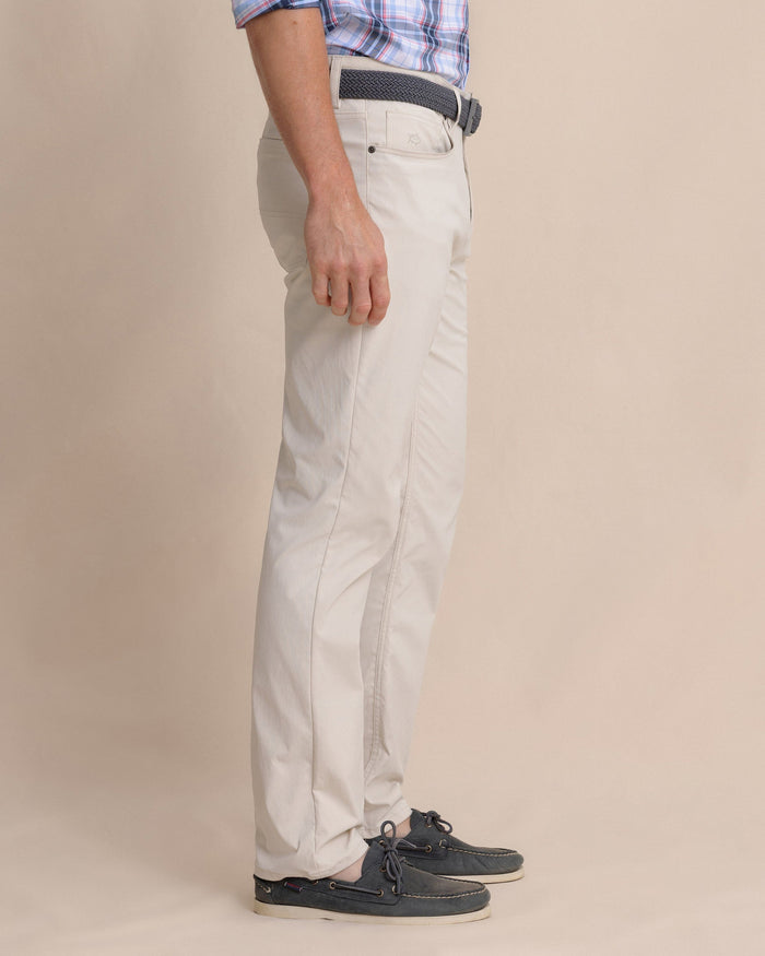 The side view of the Southern Tide Intercoastal Performance Pant by Southern Tide - Stone