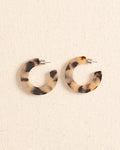The front view of the Machete Kate Hoop Earrings by Southern Tide - Blonde Tortoise