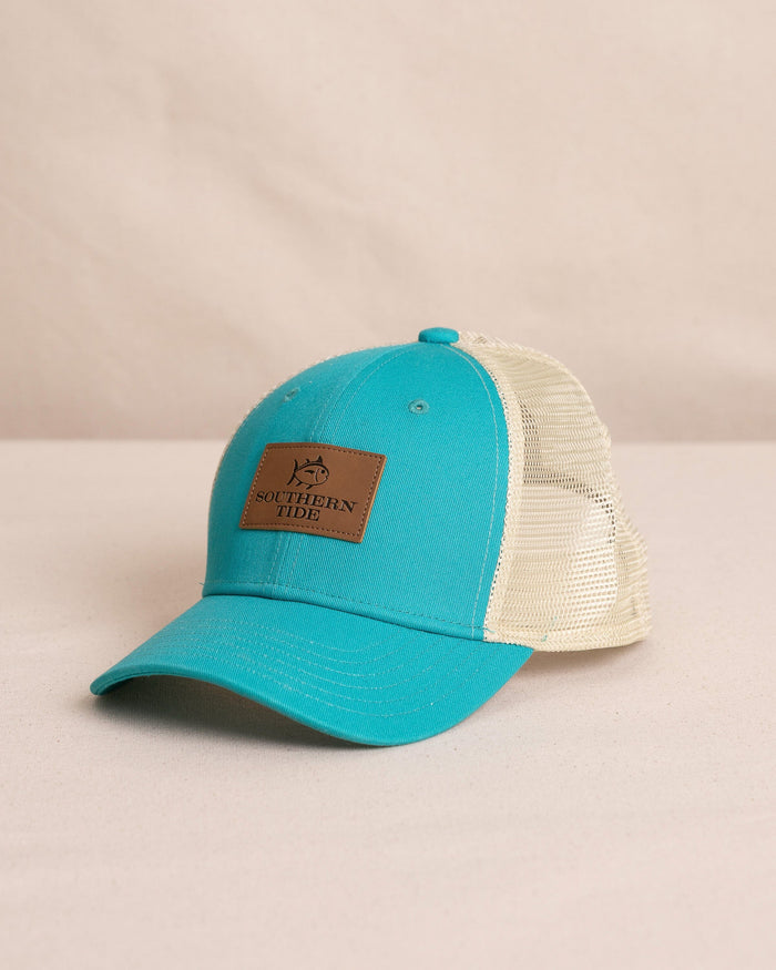 The front view of the Southern Tide Kids ST Leather Patch Trucker Hat by Southern Tide - Spruce Shade